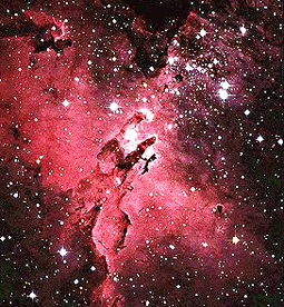 Part of the M16 Eagle Nebula, heated to the H II stage.